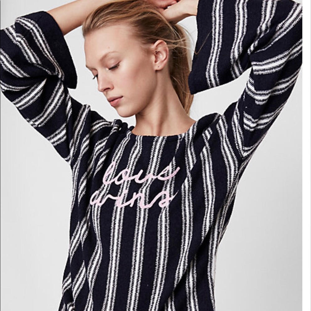 Stripe Love wins scoop back flare sleeve sweater